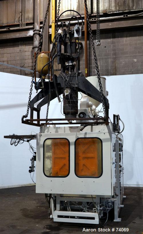 Used Hayssen Econoblow Blow Molding Machine, Model 75-S-2500. 5 lb FIFO accumulator head with programmable controls and MOOG parison programming. Also equipped with a part take away device and a bott...