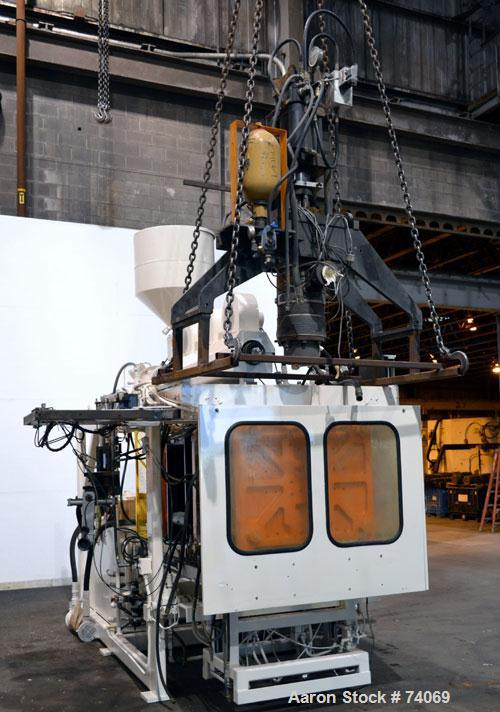Used Hayssen Econoblow Blow Molding Machine, Model 75-S-2500. 5 lb FIFO accumulator head with programmable controls and MOOG parison programming. Also equipped with a part take away device and a bott...