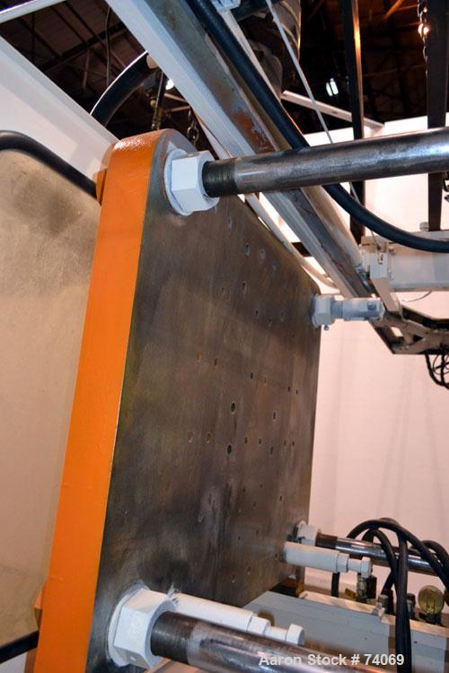Used Hayssen Econoblow Blow Molding Machine, Model 75-S-2500. 5 lb FIFO accumulator head with programmable controls and MOOG parison programming. Also equipped with a part take away device and a bott...