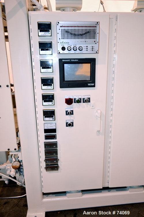 Used Hayssen Econoblow Blow Molding Machine, Model 75-S-2500. 5 lb FIFO accumulator head with programmable controls and MOOG parison programming. Also equipped with a part take away device and a bott...