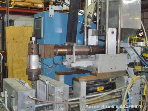Used Rocheleau blow molder, model R4-99-155, single head.