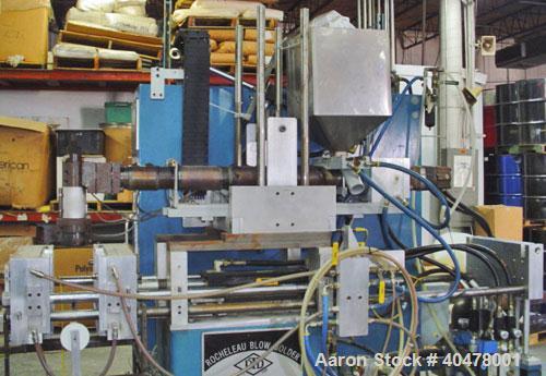 Used Rocheleau blow molder, model R4-99-155, single head.