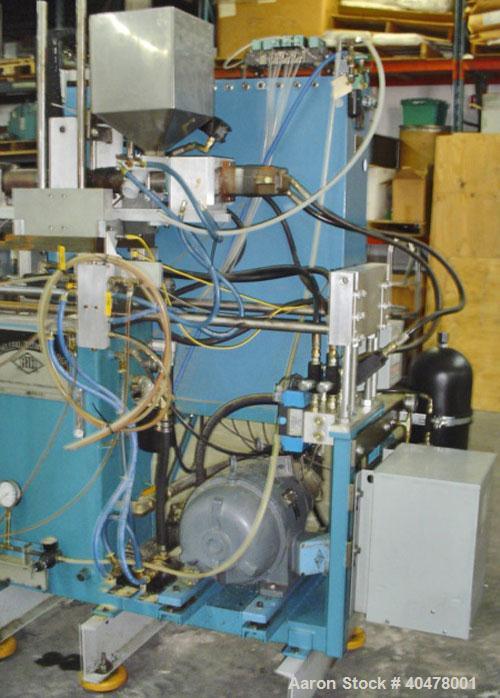 Used Rocheleau blow molder, model R4-99-155, single head.