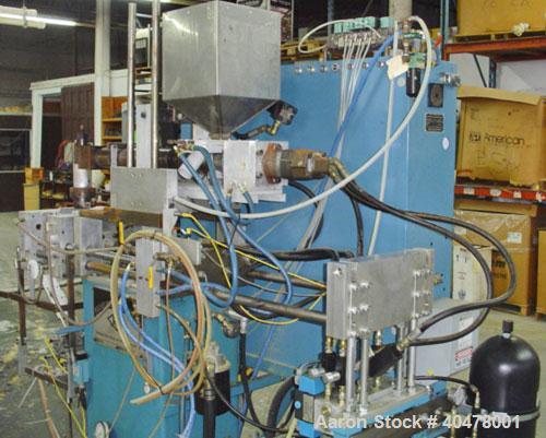 Used Rocheleau blow molder, model R4-99-155, single head.