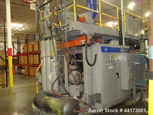 Used SIG Kautex Model KT75 Accumulator Blow Molder.  Dual head.  Shot size capacity 5.8 lbs.  Screw size 3.94" with L/D ratio 25:1.  Horsepower 125 @ 1750 rpm.  Approximately 660 lbs p/hour.  Through...