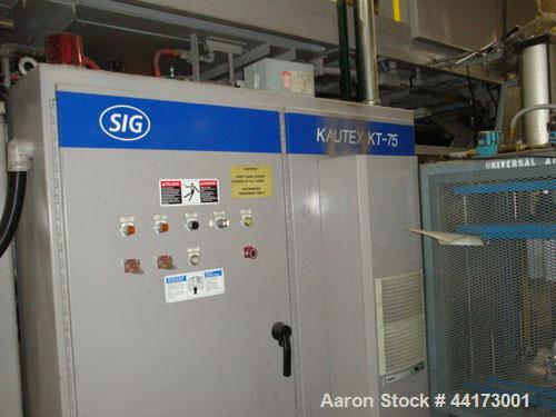 Used SIG Kautex Model KT75 Accumulator Blow Molder.  Dual head.  Shot size capacity 5.8 lbs.  Screw size 3.94" with L/D ratio 25:1.  Horsepower 125 @ 1750 rpm.  Approximately 660 lbs p/hour.  Through...