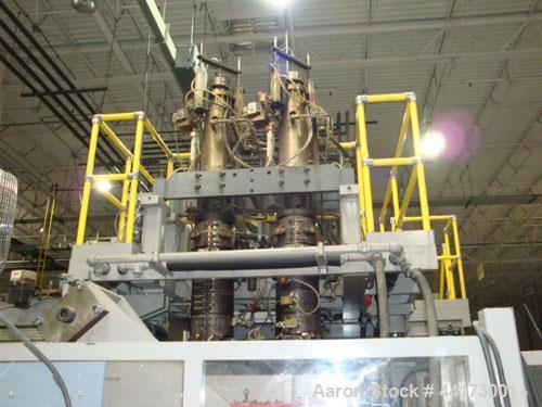Used SIG Kautex Model KT75 Accumulator Blow Molder.  Dual head.  Shot size capacity 5.8 lbs.  Screw size 3.94" with L/D ratio 25:1.  Horsepower 125 @ 1750 rpm.  Approximately 660 lbs p/hour.  Through...