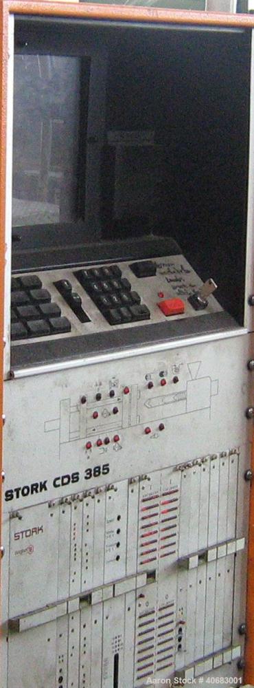 Used Stork ST4000-550 blow molder. Year of construction 1986. Clamp pressure 550 t, CDS 385 control panel, Geiger LR 21 CNC robot, cooling system, pre-mixer Koch Technik, energy saving device, dimens...