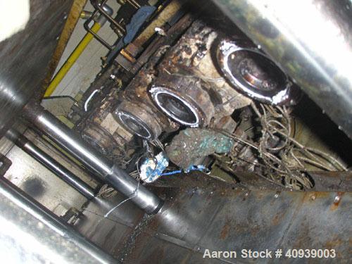 Used Uniloy Model 350R2 6-Head Blow Molder, serial #4665, new December 1998. Has Maaco 8000 programmer, pedestal operator control and 3.5" extruder with 125 hp AC motor and Eaton adjustable frequency...