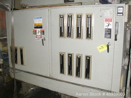 Used Uniloy Model 350R2 6-Head Blow Molder, serial #4665, new December 1998. Has Maaco 8000 programmer, pedestal operator control and 3.5" extruder with 125 hp AC motor and Eaton adjustable frequency...