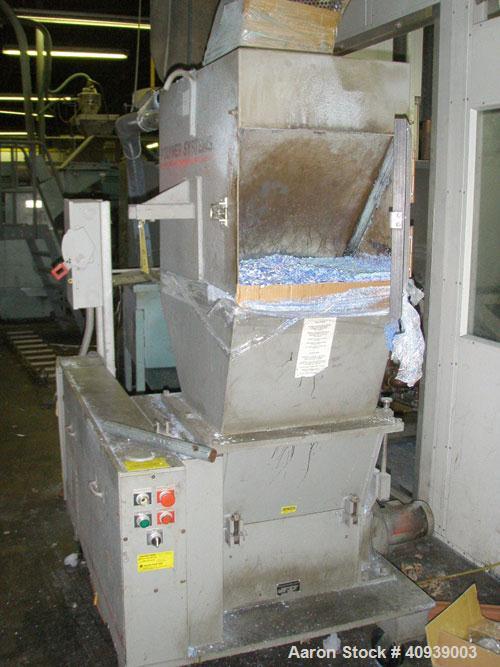 Used Uniloy Model 350R2 6-Head Blow Molder, serial #4665, new December 1998. Has Maaco 8000 programmer, pedestal operator control and 3.5" extruder with 125 hp AC motor and Eaton adjustable frequency...