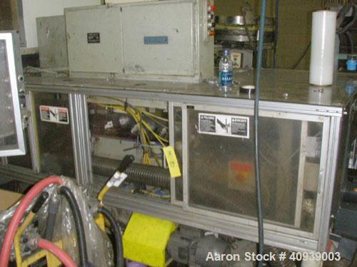 Used Uniloy Model 350R2 6-Head Blow Molder, serial #4665, new December 1998. Has Maaco 8000 programmer, pedestal operator control and 3.5" extruder with 125 hp AC motor and Eaton adjustable frequency...