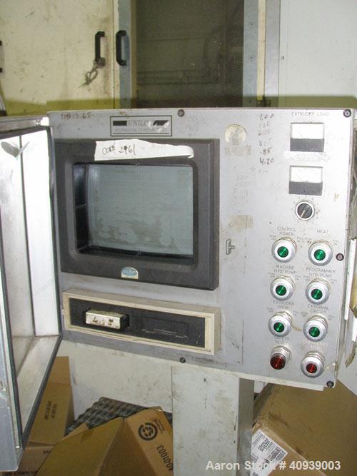 Used Uniloy Model 350R2 6-Head Blow Molder, serial #4665, new December 1998. Has Maaco 8000 programmer, pedestal operator control and 3.5" extruder with 125 hp AC motor and Eaton adjustable frequency...
