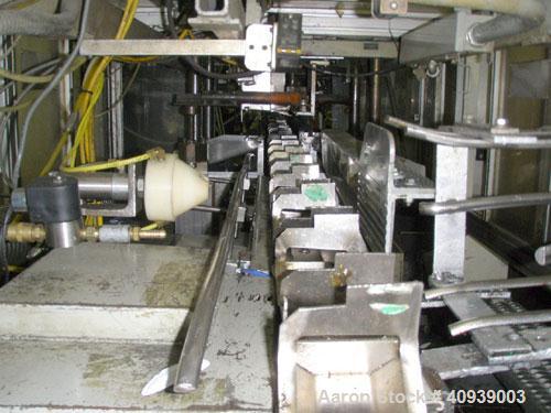 Used Uniloy Model 350R2 6-Head Blow Molder, serial #4665, new December 1998. Has Maaco 8000 programmer, pedestal operator control and 3.5" extruder with 125 hp AC motor and Eaton adjustable frequency...