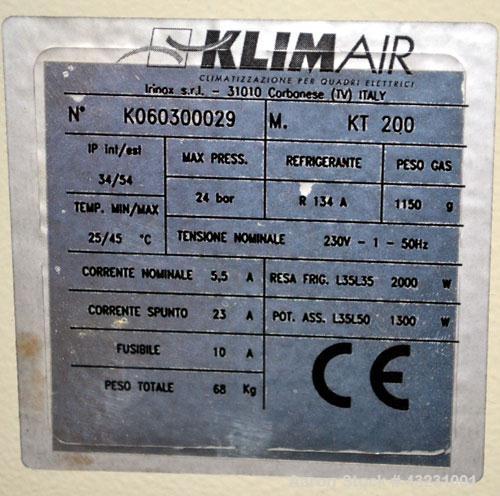 Used Uniloy Milacron Alkam Stretch Blow Molding Machine, Model BM-4. (4) Blow cavities/mould, 130mm distance between cavities. Unit includes an infeed system with a hopper, elevator, orienter, and in...