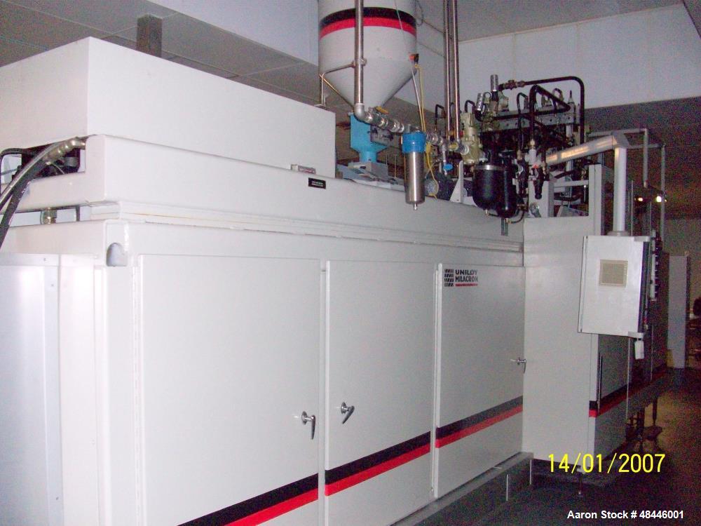 Used Uniloy Reciprocating Screw Intermittent Extrusion Blow Molding Machine, Model R2000.  80mm diameter reciprocating screw extruder, 24:1 L/D, 60 hp drive, Siemens AC variable drive with Siemens dr...