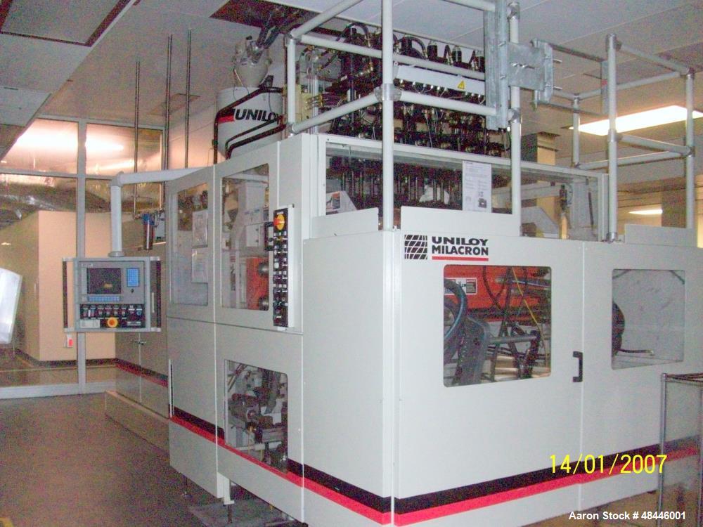 Used Uniloy Reciprocating Screw Intermittent Extrusion Blow Molding Machine, Model R2000.  80mm diameter reciprocating screw extruder, 24:1 L/D, 60 hp drive, Siemens AC variable drive with Siemens dr...