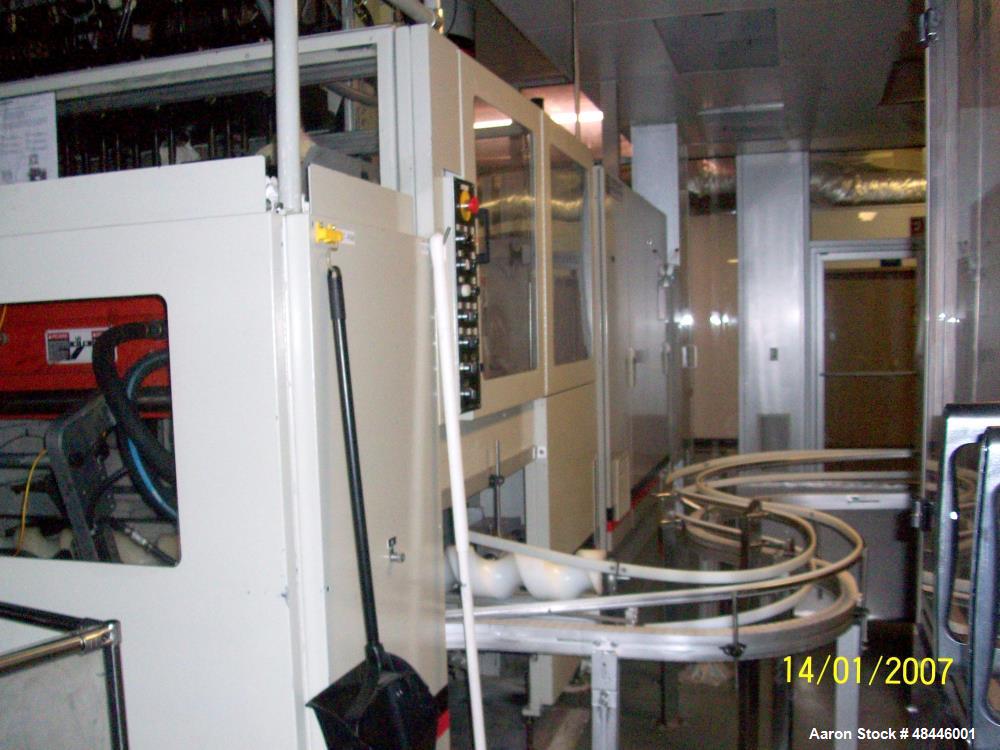 Used Uniloy Reciprocating Screw Intermittent Extrusion Blow Molding Machine, Model R2000.  80mm diameter reciprocating screw extruder, 24:1 L/D, 60 hp drive, Siemens AC variable drive with Siemens dr...
