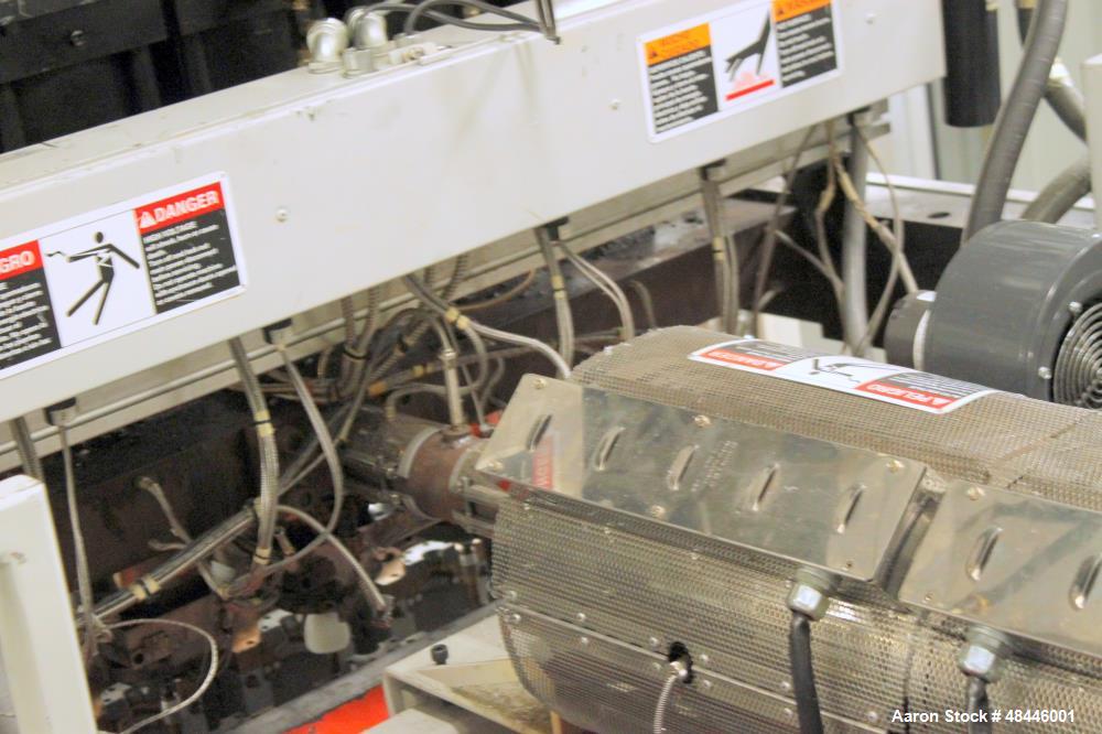 Used Uniloy Reciprocating Screw Intermittent Extrusion Blow Molding Machine, Model R2000.  80mm diameter reciprocating screw extruder, 24:1 L/D, 60 hp drive, Siemens AC variable drive with Siemens dr...