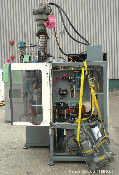 Used Jackson Machinery Triple Head VersaMatic Blow Molding Machine, Model 2165. Platen size 14-1/2" x 14-1/2", mold height 8.5’’ to 11’’. Maximum daylight 19.75", Clamp stroke 8.5". Head center 115MM...