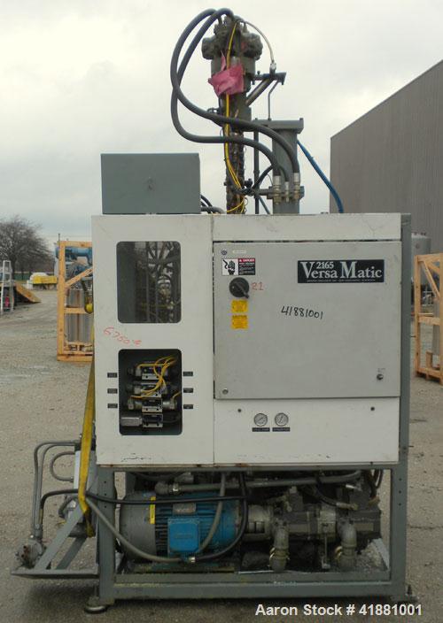 Used Jackson Machinery Triple Head VersaMatic Blow Molding Machine, Model 2165. Platen size 14-1/2" x 14-1/2", mold height 8.5’’ to 11’’. Maximum daylight 19.75", Clamp stroke 8.5". Head center 115MM...