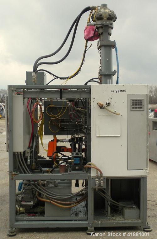 Used Jackson Machinery Triple Head VersaMatic Blow Molding Machine, Model 2165. Platen size 14-1/2" x 14-1/2", mold height 8.5’’ to 11’’. Maximum daylight 19.75", Clamp stroke 8.5". Head center 115MM...
