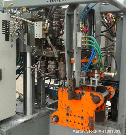 Used Jackson Machinery Triple Head VersaMatic Blow Molding Machine, Model 2165. Platen size 14-1/2" x 14-1/2", mold height 8.5’’ to 11’’. Maximum daylight 19.75", Clamp stroke 8.5". Head center 115MM...