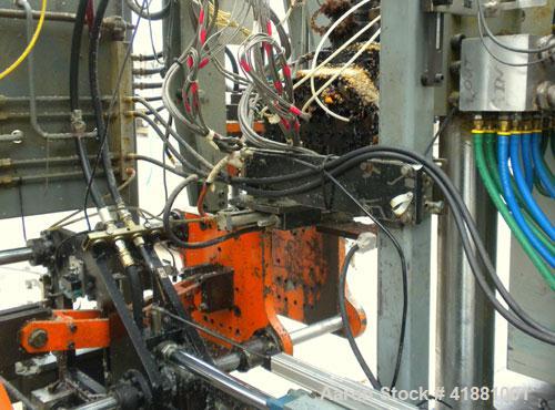 Used Jackson Machinery Triple Head VersaMatic Blow Molding Machine, Model 2165. Platen size 14-1/2" x 14-1/2", mold height 8.5’’ to 11’’. Maximum daylight 19.75", Clamp stroke 8.5". Head center 115MM...