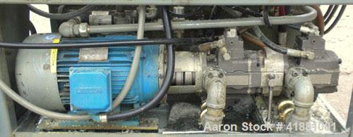 Used Jackson Machinery Triple Head VersaMatic Blow Molding Machine, Model 2165. Platen size 14-1/2" x 14-1/2", mold height 8.5’’ to 11’’. Maximum daylight 19.75", Clamp stroke 8.5". Head center 115MM...