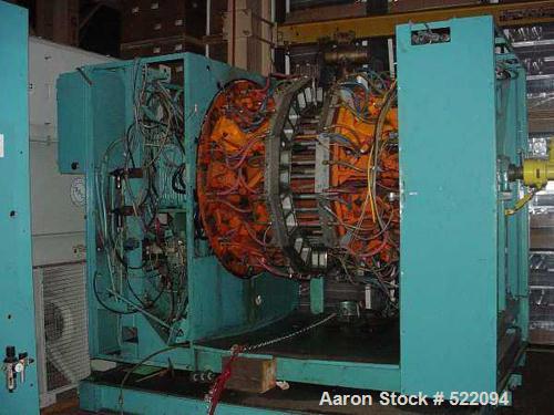 USED: Blow molding plant equipment including Wilmington 5 ton wheeltype blow molding machine, 12 stations with hydraulic clamp, DCdriven, traversing carriage, extended daylight platens, Barber Colema...