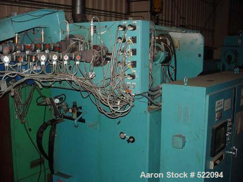 USED: Blow molding plant equipment including Wilmington 5 ton wheeltype blow molding machine, 12 stations with hydraulic clamp, DCdriven, traversing carriage, extended daylight platens, Barber Colema...