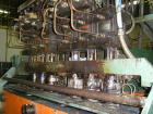 Used Uniloy Model 350R3 6 Head Blow Molder, new 1988. 6 heads are set on 8