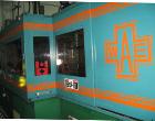 Used Amsler PET Bottle Blow Molding Machine, Model WAE 3. Was Last Running 1 L x 3 Up. 460 Volt/50 Amps plus 380 Volt/50 Amps.