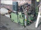 USED: Fischer blow molder, model VK1-6D. Dual heads, double sided,dual parison (150mm centers), 4 cavity, approx range 4 oz to 2 gallon,80mm diameter screw. Complete with reflashing, parison and extr...