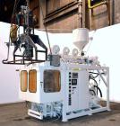 Used Hayssen Econoblow Blow Molding Machine, Model 75-S-2500. 5 lb FIFO accumulator head with programmable controls and MOOG parison programming. Also equipped with a part take away device and a bott...
