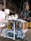 Used Hayssen Econoblow Blow Molding Machine, Model 75-S-2500. 5 lb FIFO accumulator head with programmable controls and MOOG parison programming. Also equipped with a part take away device and a bott...
