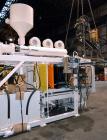 Used Hayssen Econoblow Blow Molding Machine, Model 75-S-2500. 5 lb FIFO accumulator head with programmable controls and MOOG parison programming. Also equipped with a part take away device and a bott...