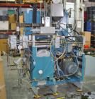 Used Rocheleau blow molder, model R4-99-155, single head.