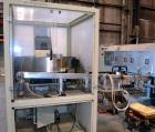 Used Uniloy Milacron Alkam Stretch Blow Molding Machine, Model BM-4. (4) Blow cavities/mould, 130mm distance between cavities. Unit includes an infeed system with a hopper, elevator, orienter, and in...