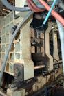 Used Uniloy Milacron Alkam Stretch Blow Molding Machine, Model BM-5. (5) Blow cavities/mould, 105mm distance between cavities. Unit includes an infeed system with a hopper, elevator, orienter, and in...
