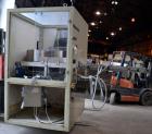 Used Uniloy Milacron Alkam Stretch Blow Molding Machine, Model BM-5. (5) Blow cavities/mould, 105mm distance between cavities. Unit includes an infeed system with a hopper, elevator, orienter, and in...