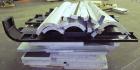 Used Uniloy Milacron Alkam Stretch Blow Molding Machine, Model BM-5. (5) Blow cavities/mould, 105mm distance between cavities. Unit includes an infeed system with a hopper, elevator, orienter, and in...