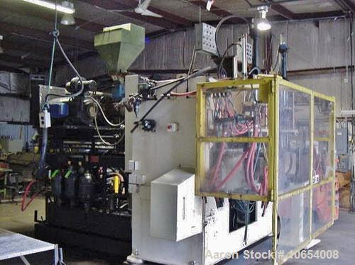 Used-Fischer Blow Molding Machine, Model FHB-106-2.  Dual shuttle, many heads to choose from.  Maco 100 point Parison progra...