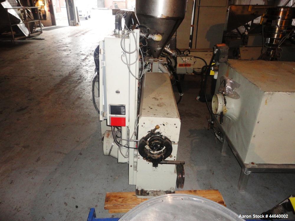 Used Battenfeld Three Layer Blown Film Line consisting of the following: 2" Battenfeld extruder, 30:1 L/D, electrically heated, water cooled, feed hopper with 50 hp DC motor with SCR controller, 2" B...