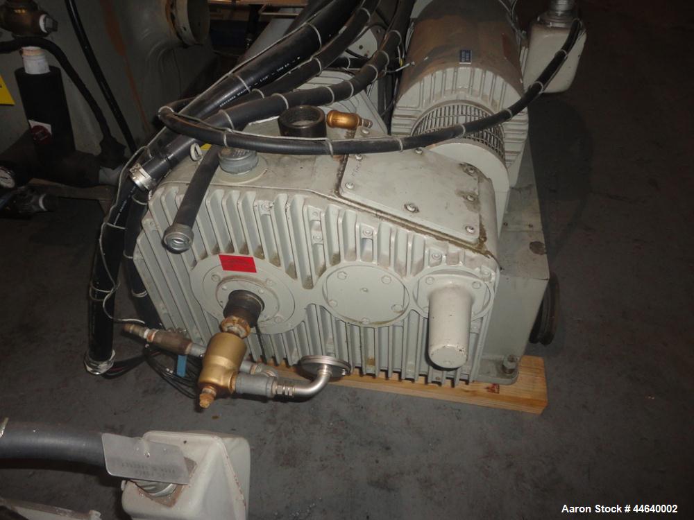 Used Battenfeld Three Layer Blown Film Line consisting of the following: 2" Battenfeld extruder, 30:1 L/D, electrically heated, water cooled, feed hopper with 50 hp DC motor with SCR controller, 2" B...