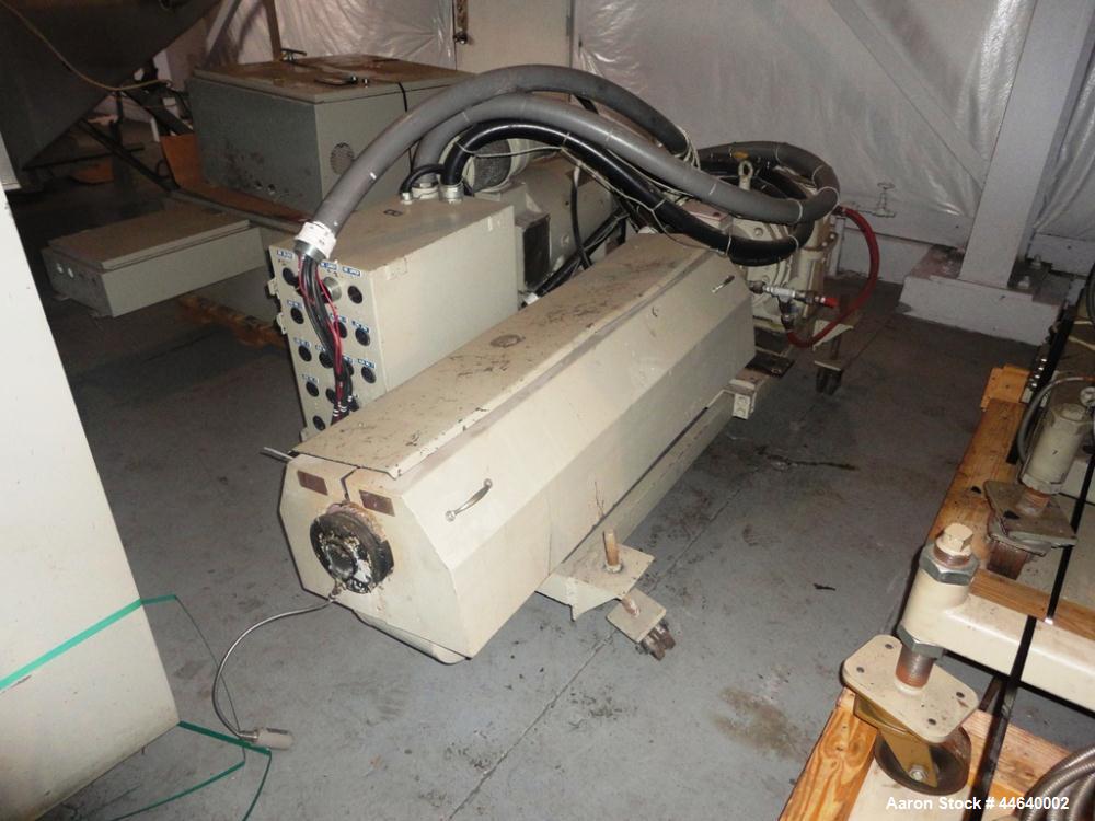 Used Battenfeld Three Layer Blown Film Line consisting of the following: 2" Battenfeld extruder, 30:1 L/D, electrically heated, water cooled, feed hopper with 50 hp DC motor with SCR controller, 2" B...