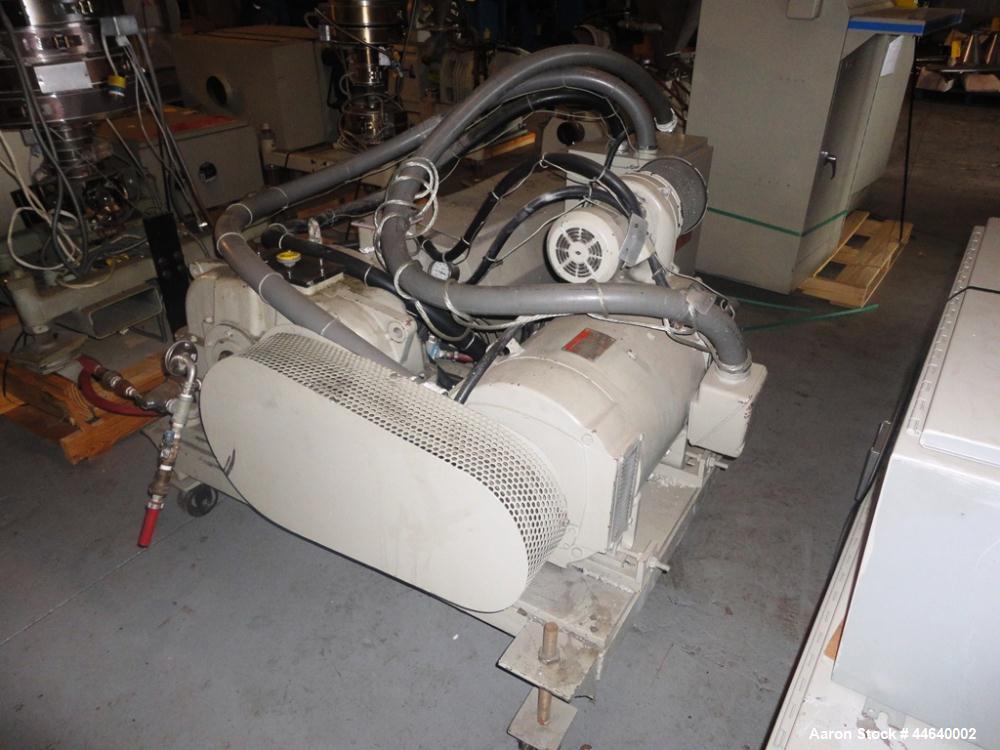 Used Battenfeld Three Layer Blown Film Line consisting of the following: 2" Battenfeld extruder, 30:1 L/D, electrically heated, water cooled, feed hopper with 50 hp DC motor with SCR controller, 2" B...