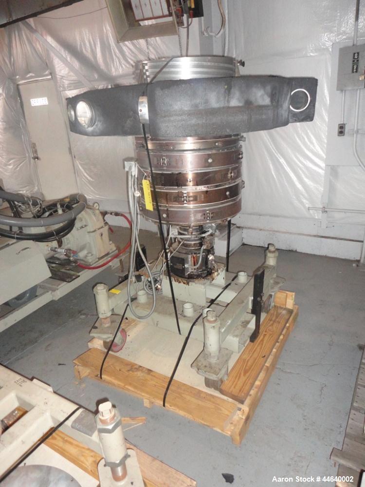 Used Battenfeld Three Layer Blown Film Line consisting of the following: 2" Battenfeld extruder, 30:1 L/D, electrically heated, water cooled, feed hopper with 50 hp DC motor with SCR controller, 2" B...