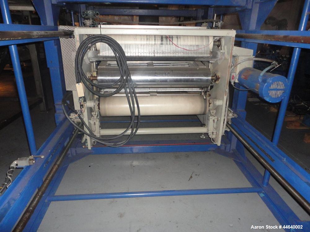 Used Battenfeld Three Layer Blown Film Line consisting of the following: 2" Battenfeld extruder, 30:1 L/D, electrically heated, water cooled, feed hopper with 50 hp DC motor with SCR controller, 2" B...