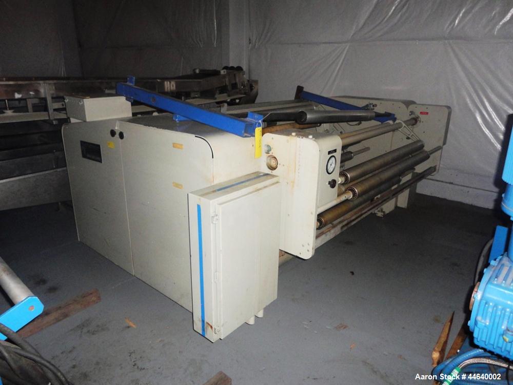 Used Battenfeld Three Layer Blown Film Line consisting of the following: 2" Battenfeld extruder, 30:1 L/D, electrically heated, water cooled, feed hopper with 50 hp DC motor with SCR controller, 2" B...